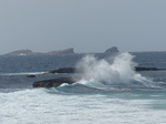FZ028292 Waves splashing against island by Cala Compte.jpg